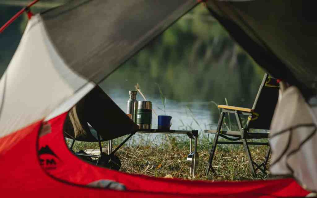 Best Whidbey Island Camping. Looking out at a lake from the comfort of your tent.
